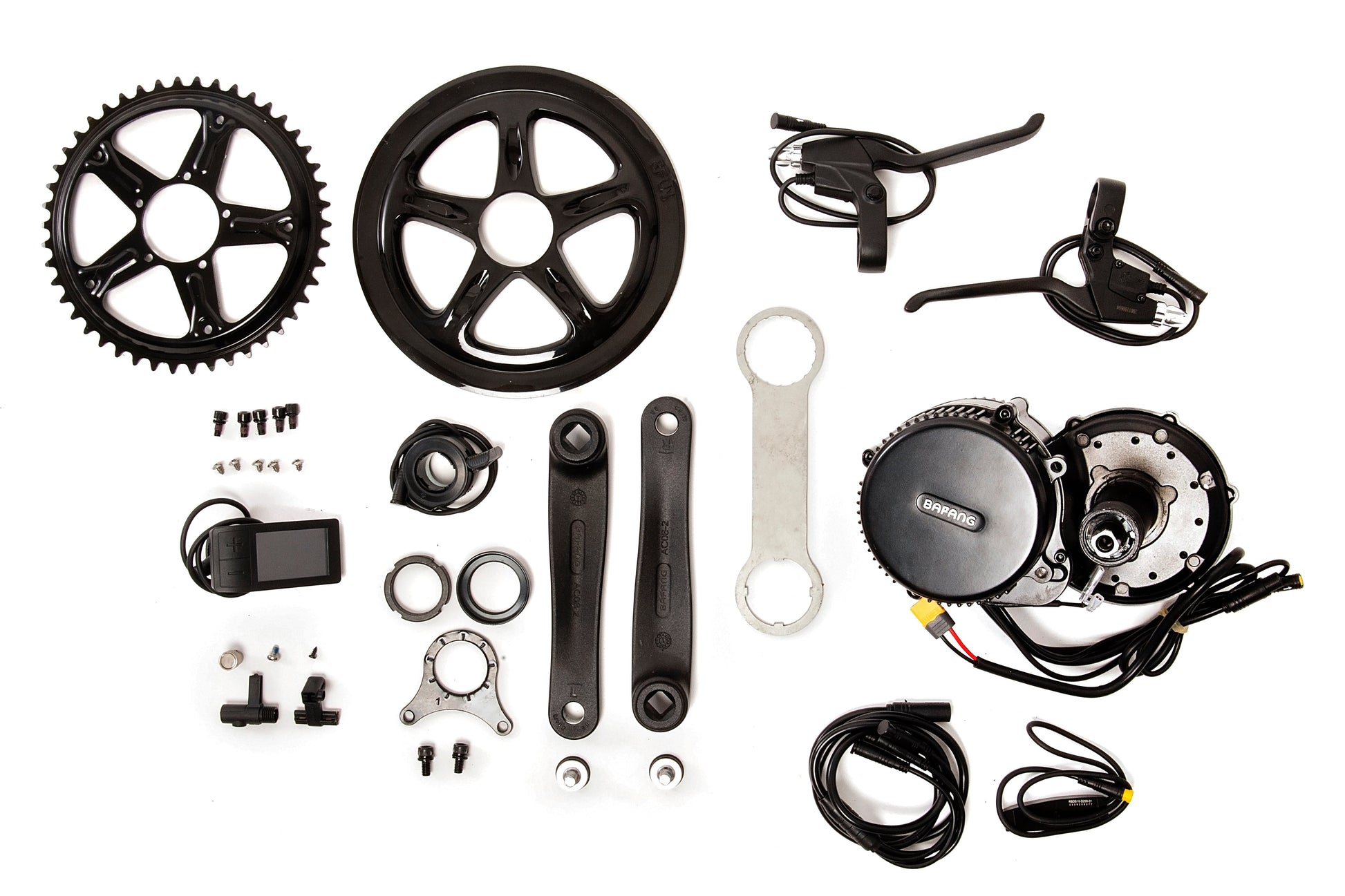 Bafang BBS02 mid drive motor parts and tools for eBike conversion kit laid out on white background